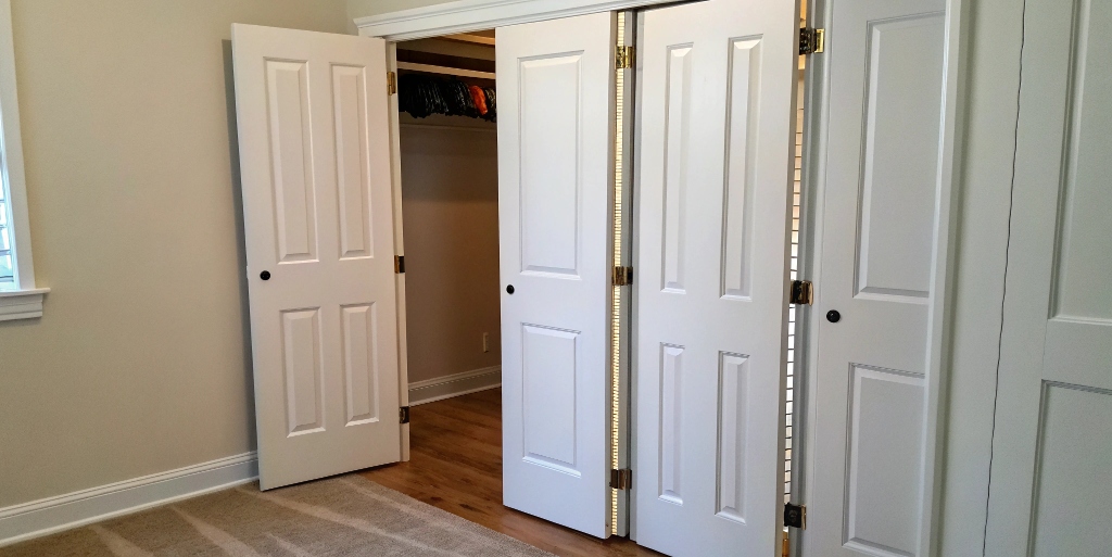 How do I adjust my bifold closet doors